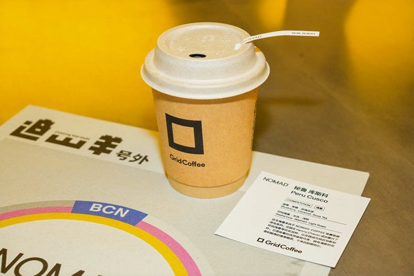 Grid Coffee Teams Up with Nomad for Specialty Coffee Experience