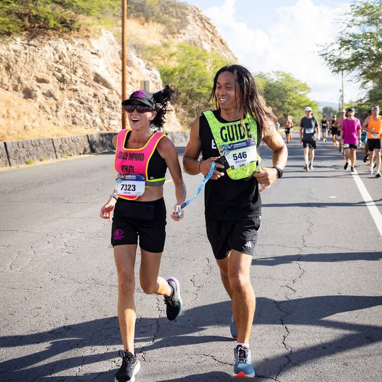 Inspiring Visually-Impaired Runner Takes on Kona Marathon